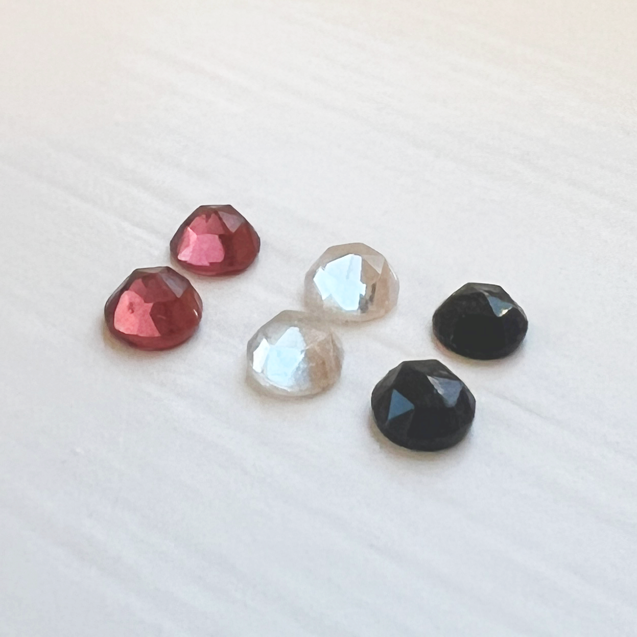 Pairs of Rose Cut Garnet, White Topaz or Black Spinel gemstones