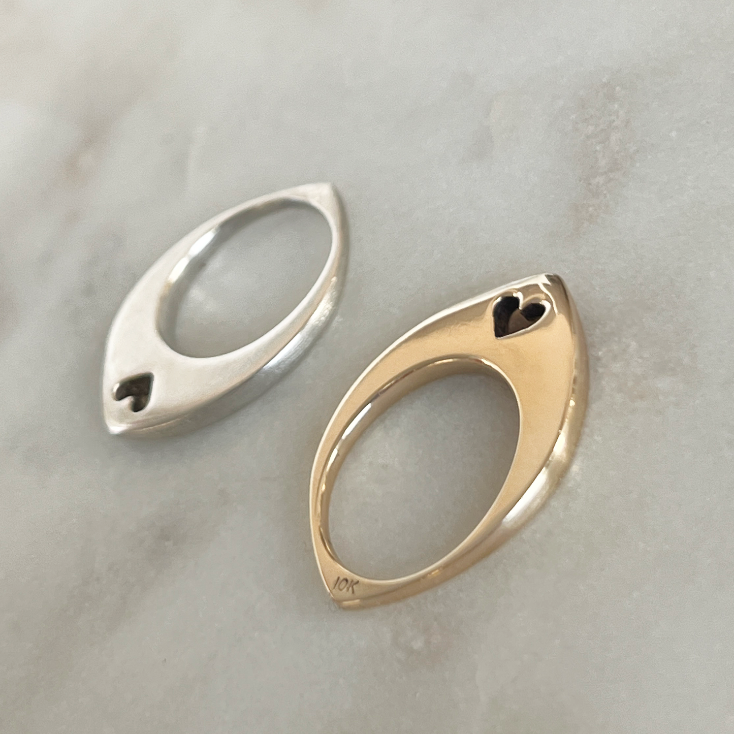 Silver and Gold Slice Ring Options Flat Lay White Marble