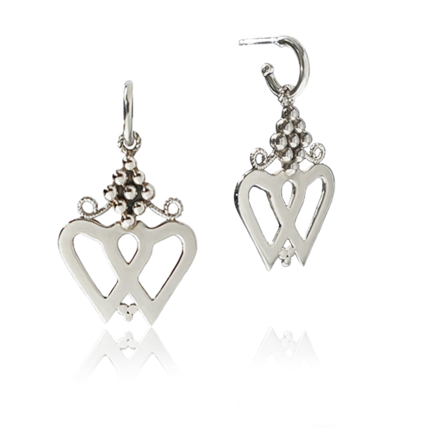 Silver Luckenbooth Earrings dangle from Huggie Hoops