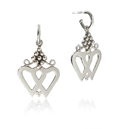 Silver Luckenbooth Earrings dangle from Huggie Hoops